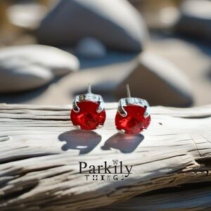 Handcrafted earrings with a red Swarovski crystal